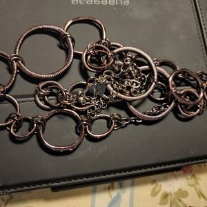 A lovely deep bronze necklace or belt.